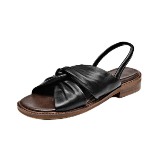 Sheepskin summer sandals with cross straps, flat sole, open toe, Roman style, lightweight rubber sole, and breathable comfort.