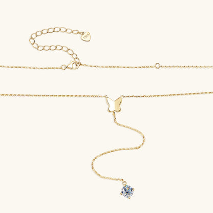 Elegant butterfly necklace with a silver pendant and O-shaped chain, available in gold and white. Perfect for women who love nature-inspired jewelry