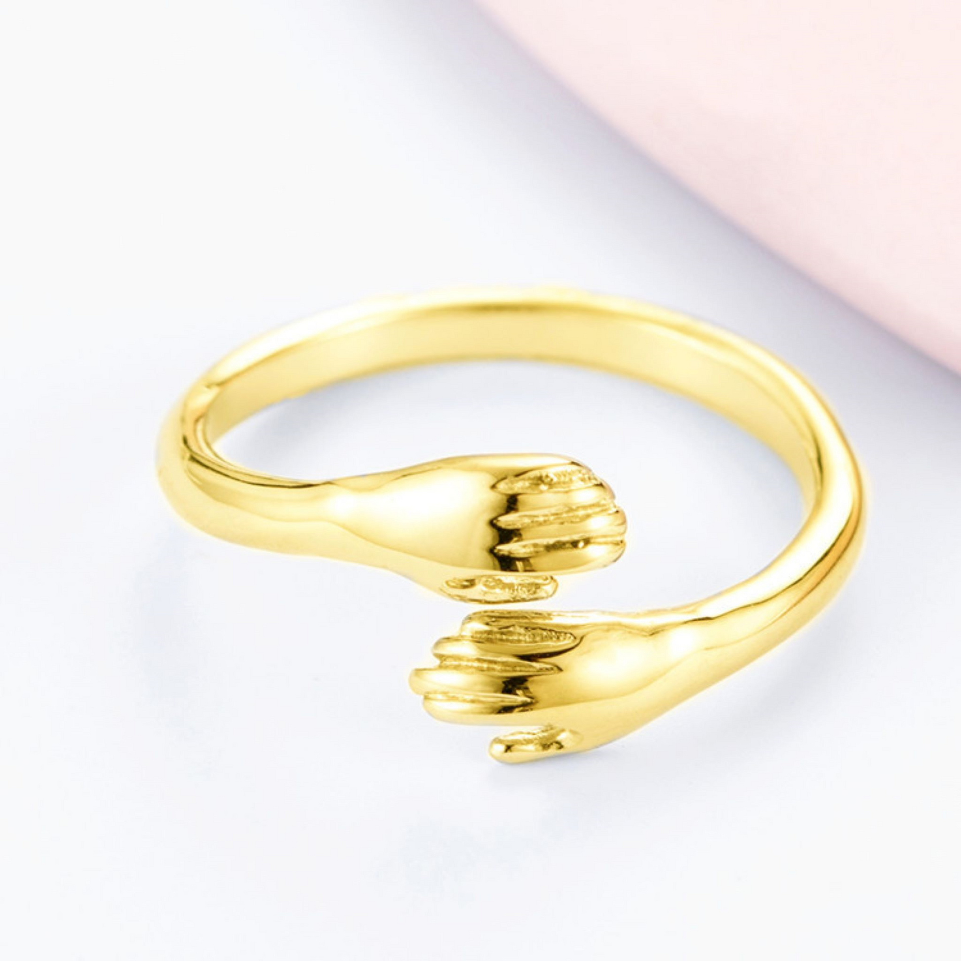 An all-match temperament love hug couple opening adjustable ring featuring a unique design that symbolizes connection and affection. This stylish ring showcases a sleek band with a gentle hug motif, crafted in a polished finish. Its adjustable size makes it perfect for couples, representing love and unity in a fashionable way