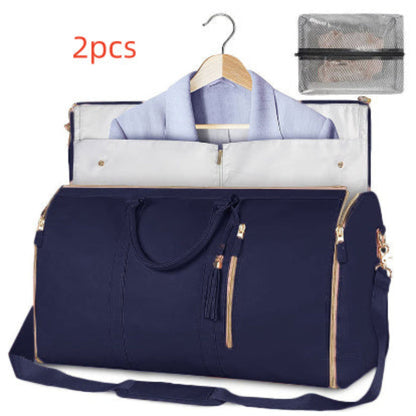 Stylish waterproof duffle handbag with multiple pockets and zippers, resting on a sandy beach, perfect for travel adventures