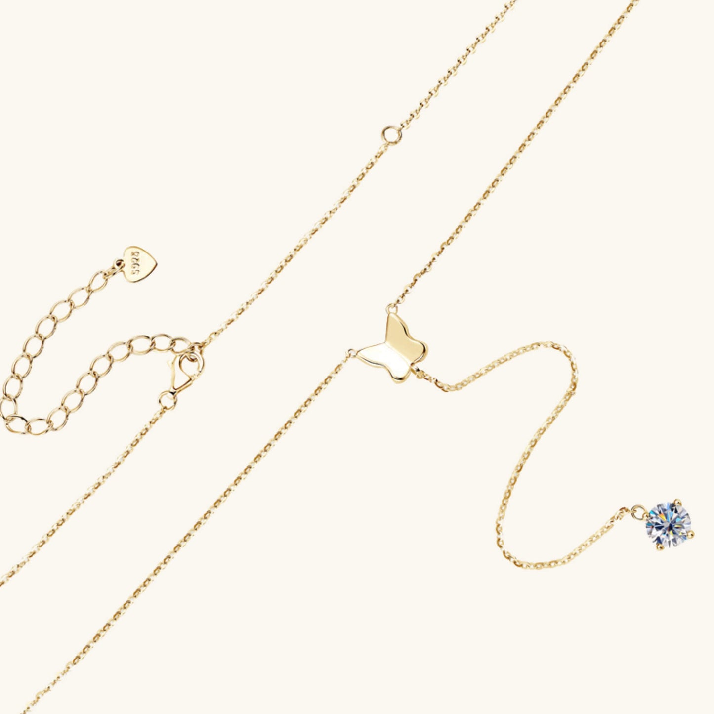 Elegant butterfly necklace with a silver pendant and O-shaped chain, available in gold and white. Perfect for women who love nature-inspired jewelry