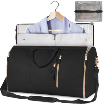 Waterproof travel duffle handbag in a sleek design, featuring sturdy handles and a detachable shoulder strap, set against a scenic outdoor backdrop