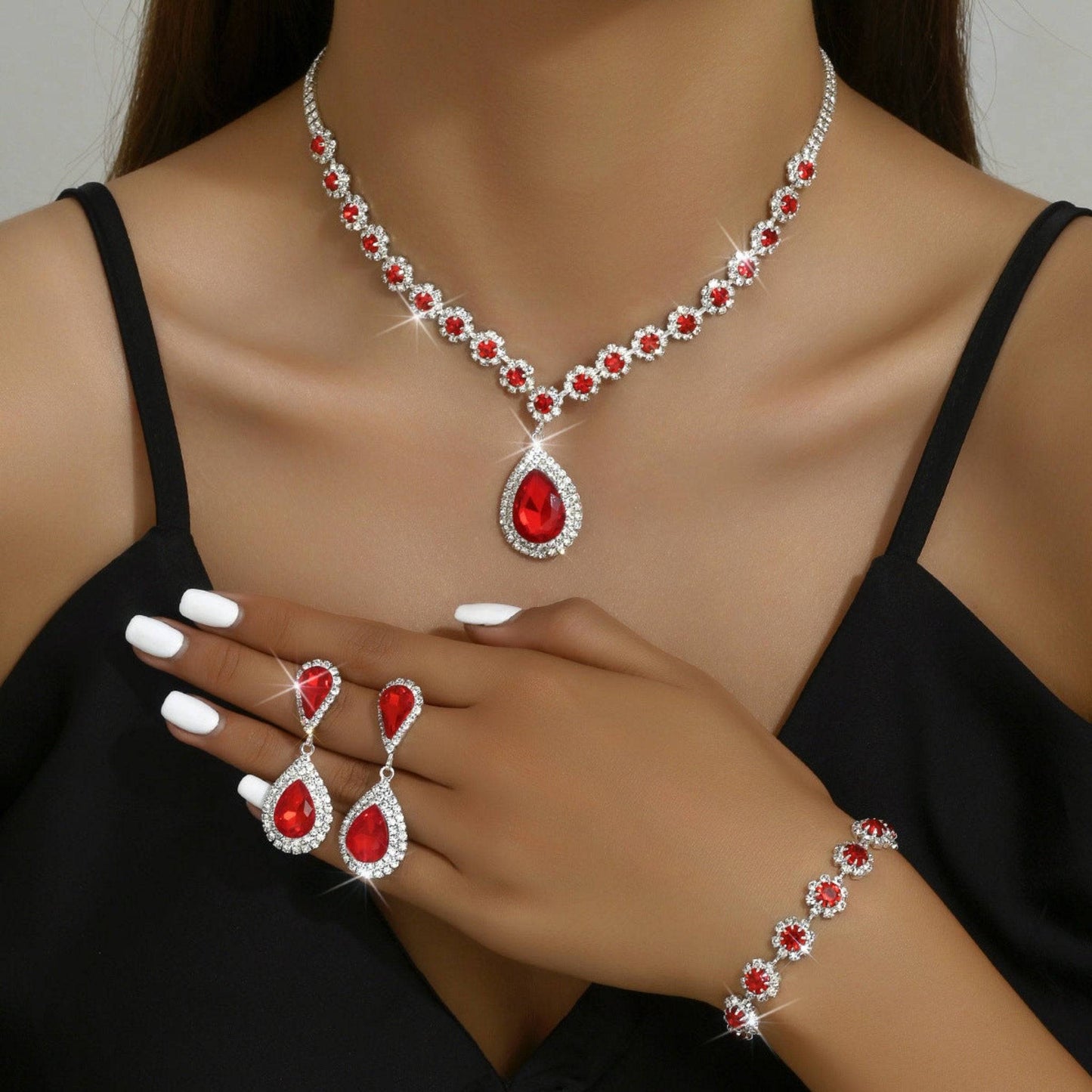 Elegant bridal jewelry set with rhinestone necklace, earrings, and bracelet. Available in White, Sapphire Blue, Red, and Holes Green. Perfect for weddings