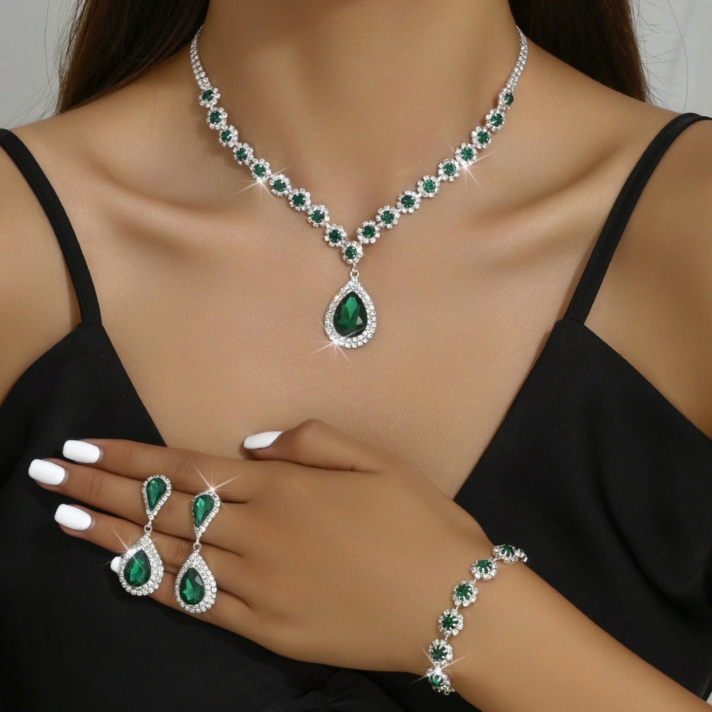 Elegant bridal jewelry set with rhinestone necklace, earrings, and bracelet. Available in White, Sapphire Blue, Red, and Holes Green. Perfect for weddings