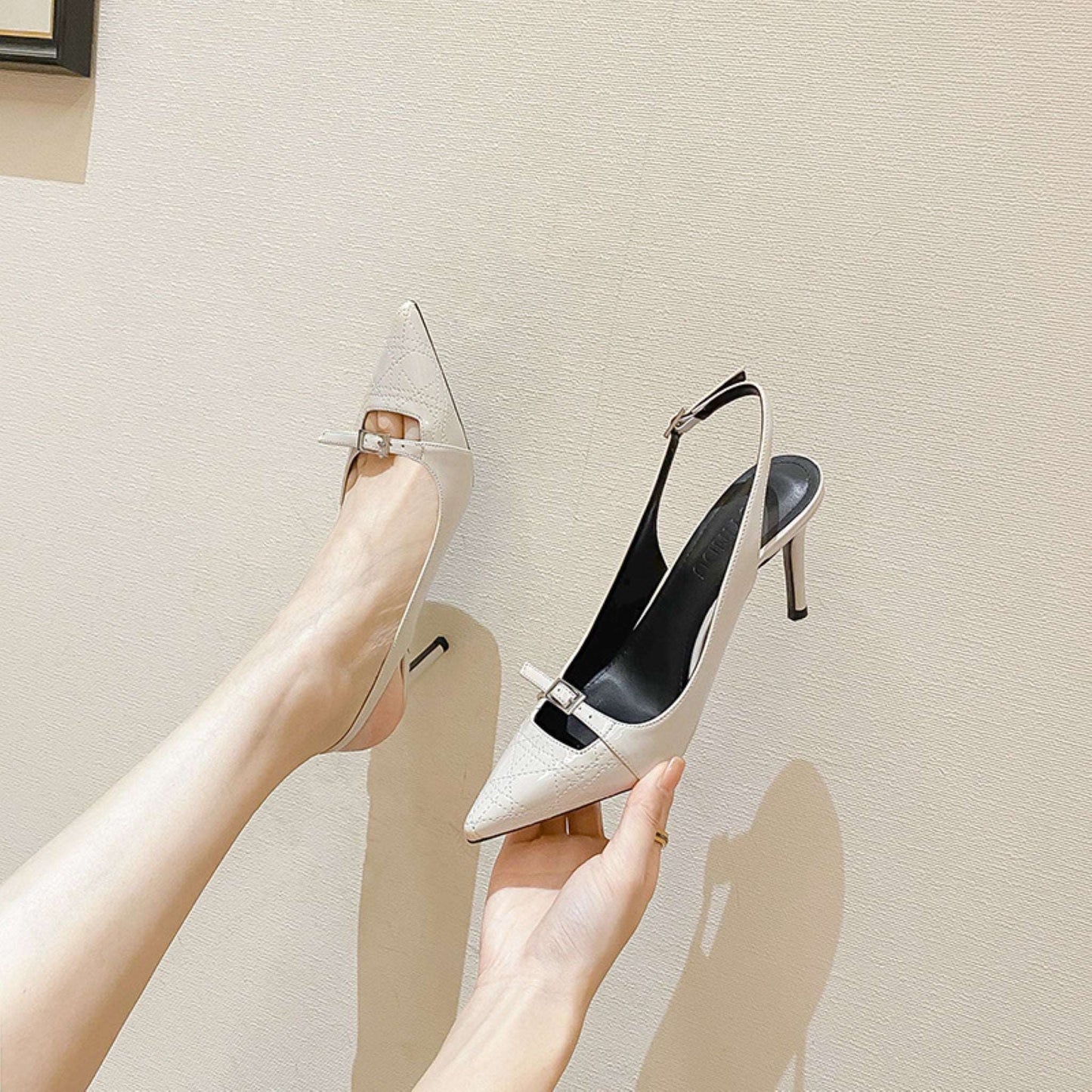 Sleek slingback stiletto heels with a classic pointed toe design, offering a sophisticated and stylish look. These heels are ideal for both formal events and stylish everyday wear