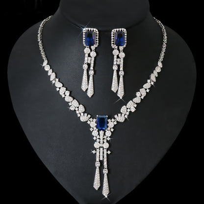 Elegant diamond flower jewelry set featuring a beautifully crafted necklace, earrings, and bracelet, all designed with intricate floral motifs. This luxurious set adds a touch of sophistication and sparkle to any special occasion.