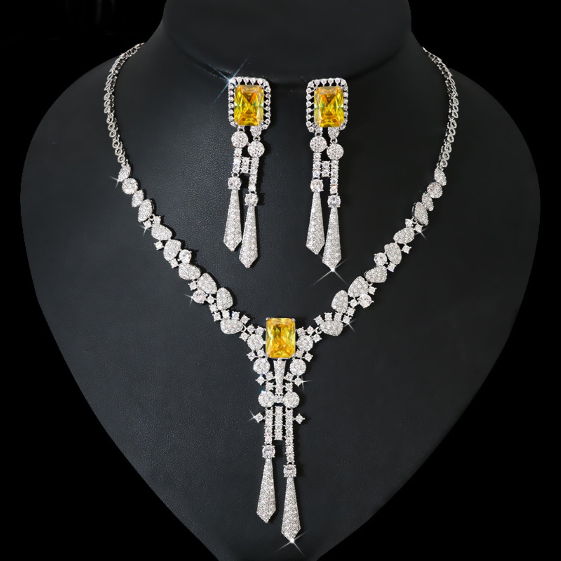 Elegant diamond flower jewelry set featuring a beautifully crafted necklace, earrings, and bracelet, all designed with intricate floral motifs. This luxurious set adds a touch of sophistication and sparkle to any special occasion.