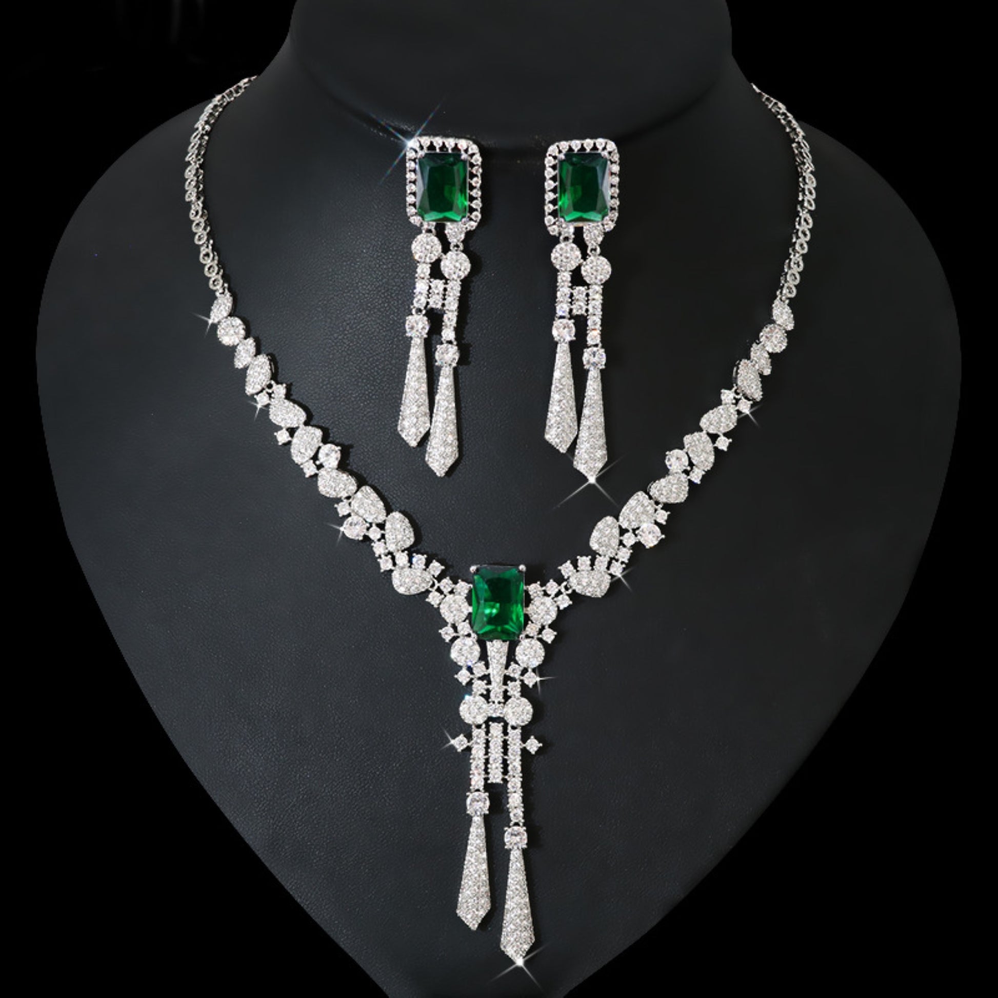 Elegant diamond flower jewelry set featuring a beautifully crafted necklace, earrings, and bracelet, all designed with intricate floral motifs. This luxurious set adds a touch of sophistication and sparkle to any special occasion.