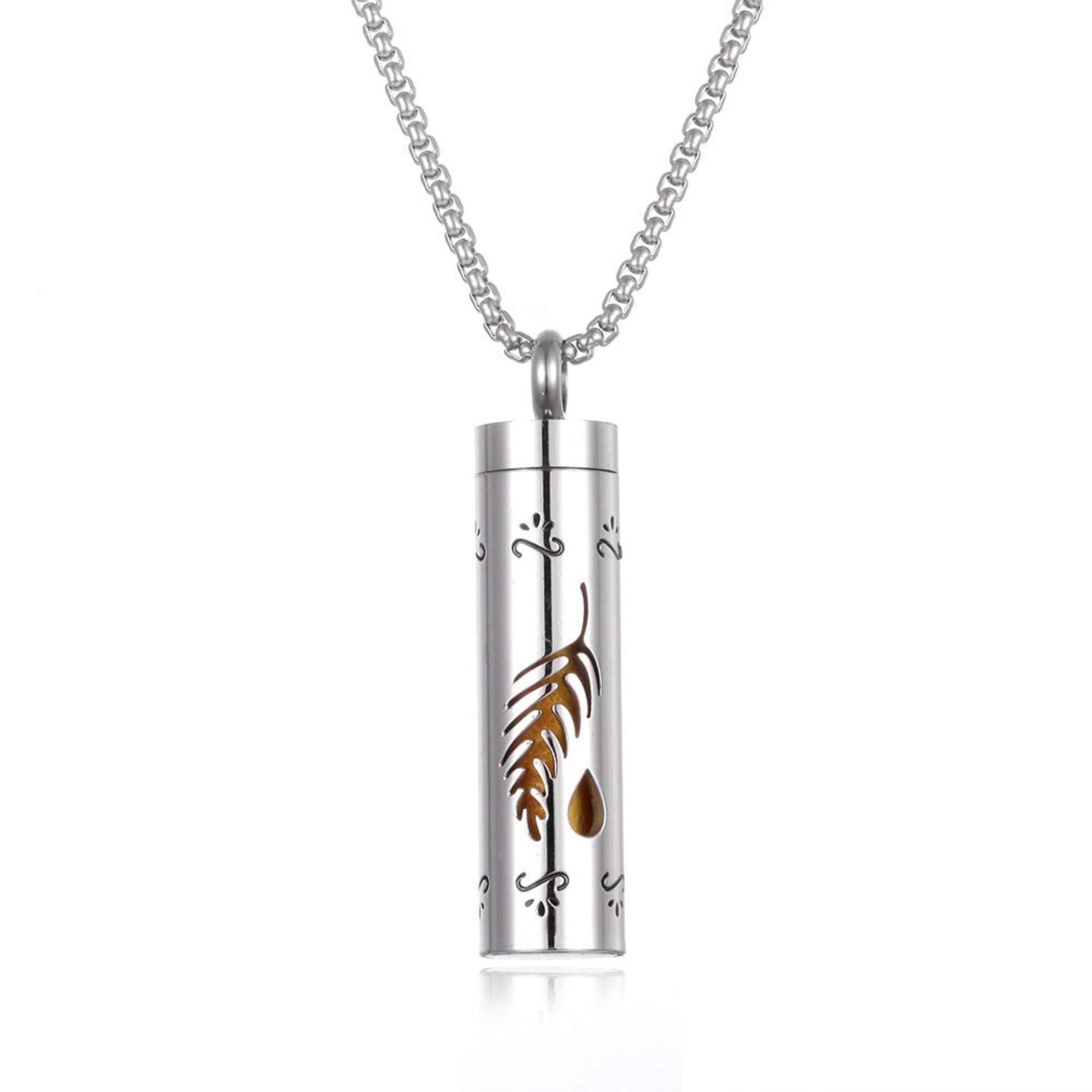 Stylish pendant necklace with an essential oil diffuser, featuring an intricate design that allows for a subtle release of fragrance, perfect for a personal, on-the-go aromatherapy experience.