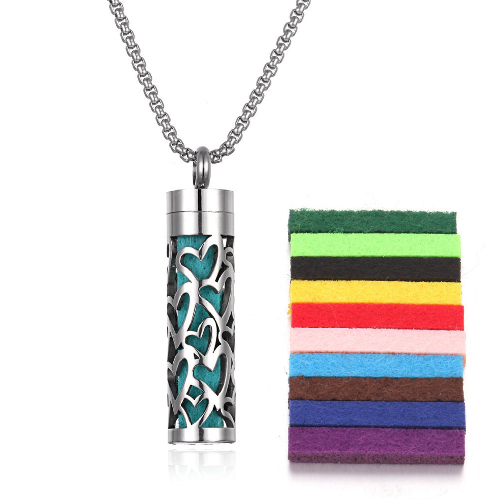 Stylish pendant necklace with an essential oil diffuser, featuring an intricate design that allows for a subtle release of fragrance, perfect for a personal, on-the-go aromatherapy experience.