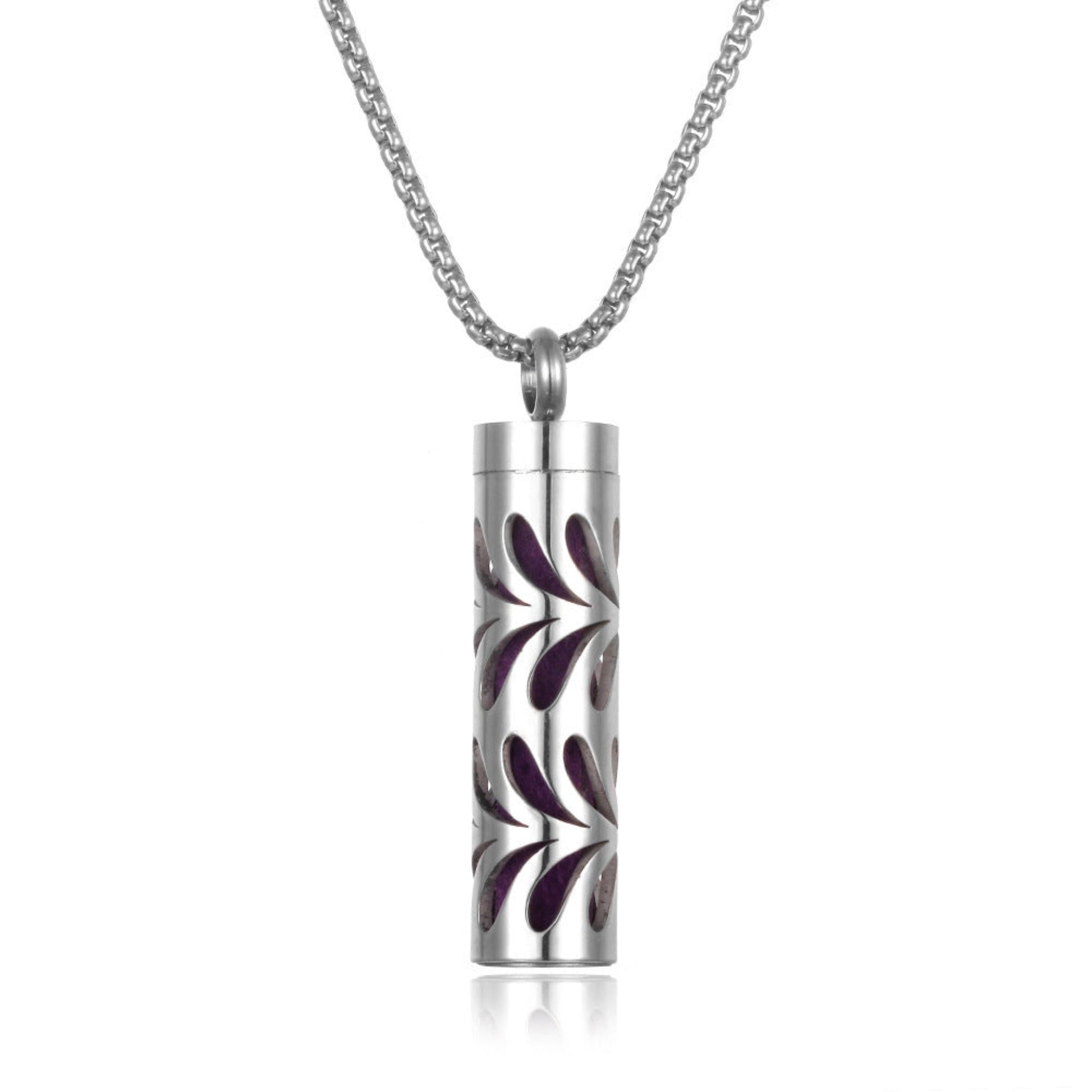 Stylish pendant necklace with an essential oil diffuser, featuring an intricate design that allows for a subtle release of fragrance, perfect for a personal, on-the-go aromatherapy experience.