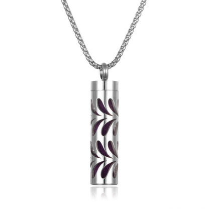 Stylish pendant necklace with an essential oil diffuser, featuring an intricate design that allows for a subtle release of fragrance, perfect for a personal, on-the-go aromatherapy experience.