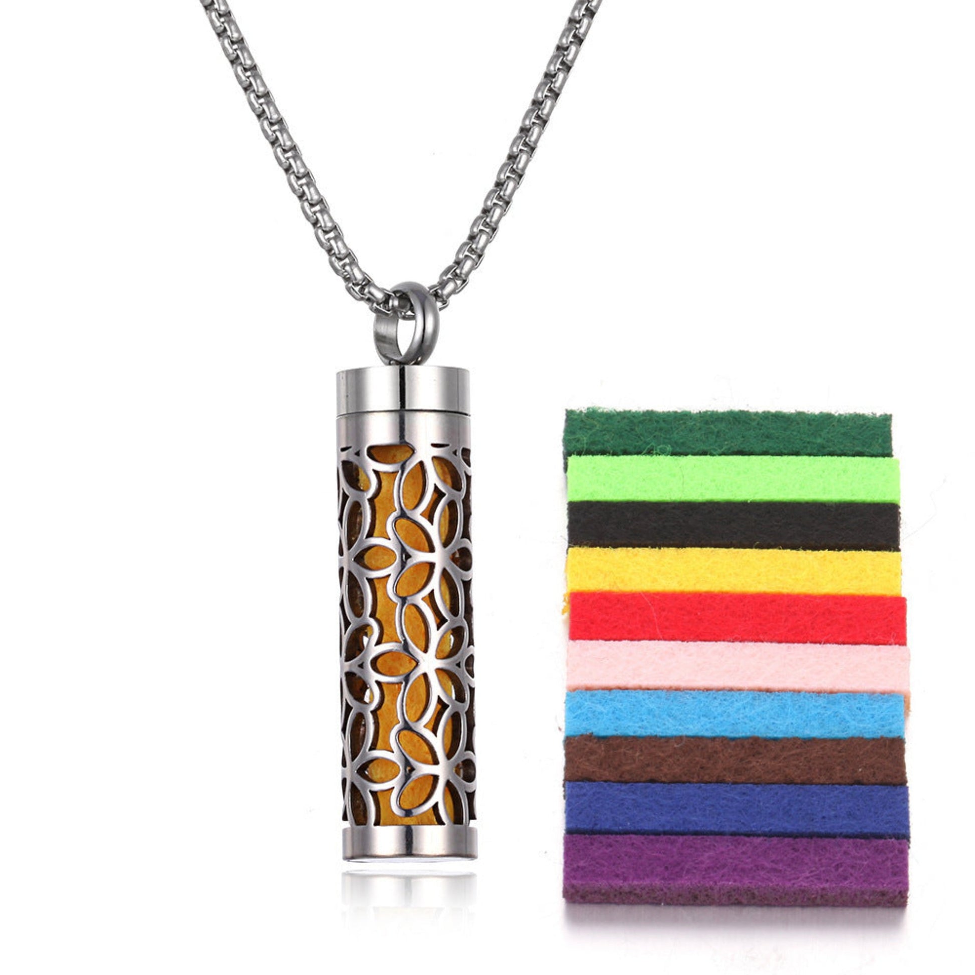 Stylish pendant necklace with an essential oil diffuser, featuring an intricate design that allows for a subtle release of fragrance, perfect for a personal, on-the-go aromatherapy experience.