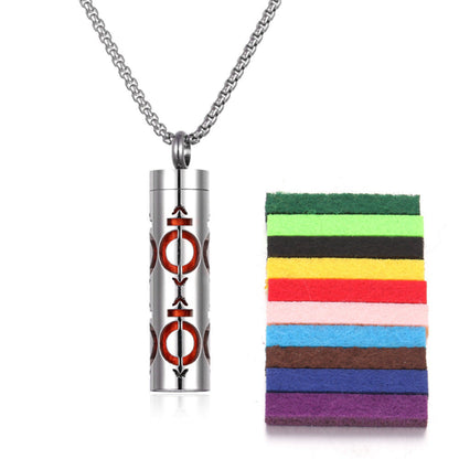 Stylish pendant necklace with an essential oil diffuser, featuring an intricate design that allows for a subtle release of fragrance, perfect for a personal, on-the-go aromatherapy experience.