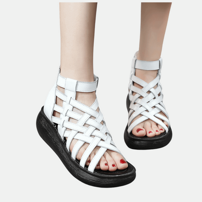 Chic retro wedge sandals with an ethnic-inspired design, featuring intricate patterns and vibrant colors, ideal for adding a unique, bohemian touch to any outfit.