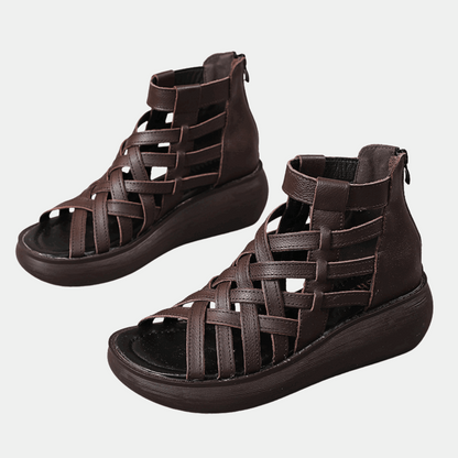 Chic retro wedge sandals with an ethnic-inspired design, featuring intricate patterns and vibrant colors, ideal for adding a unique, bohemian touch to any outfit.