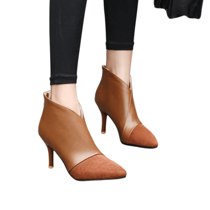 Elegant and versatile pointed-toe ankle boots for women, featuring stylish stitching details. These chic, minimalist boots offer comfort and sophistication, perfect for pairing with casual or dressy outfits alike