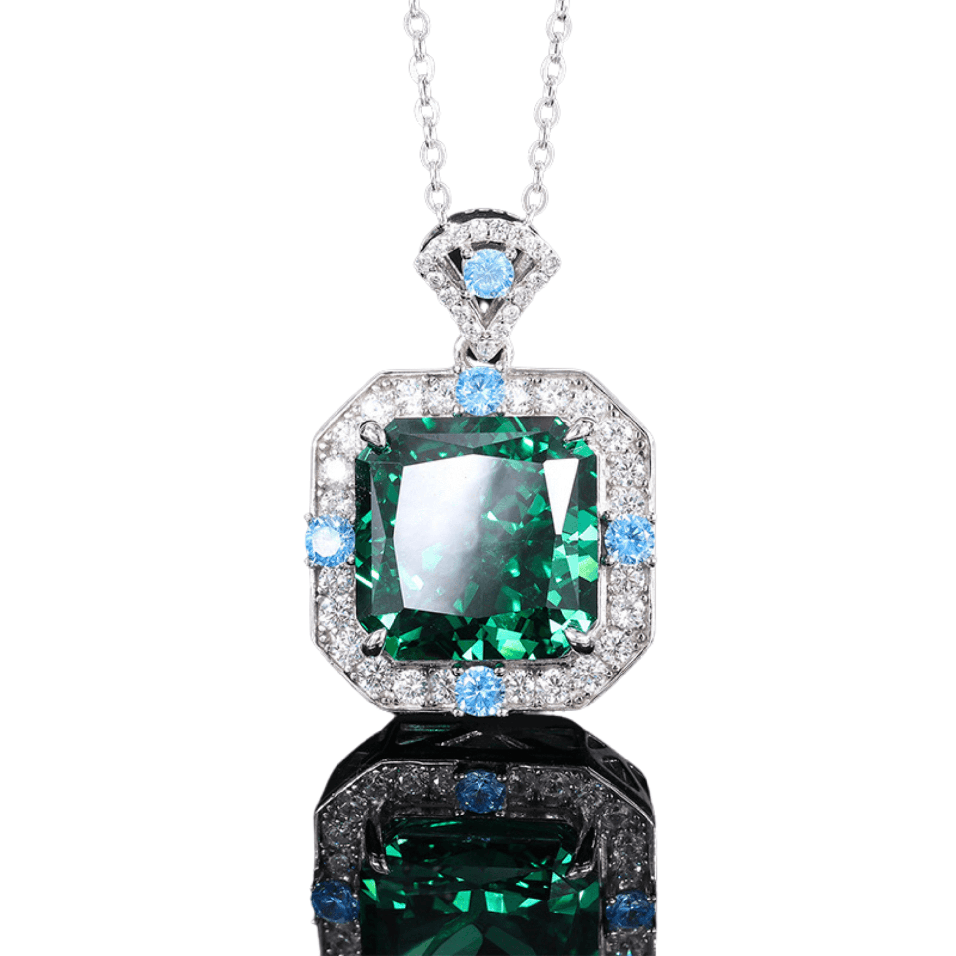 Elegant geometric silver pendant with sapphire blue and emerald accents, ideal for women’s casual or formal wear, versatile jewelry