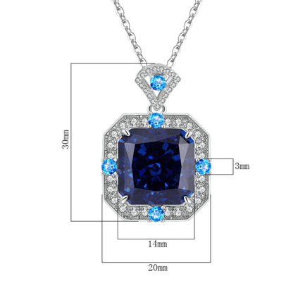 Elegant geometric silver pendant with sapphire blue and emerald accents, ideal for women’s casual or formal wear, versatile jewelry