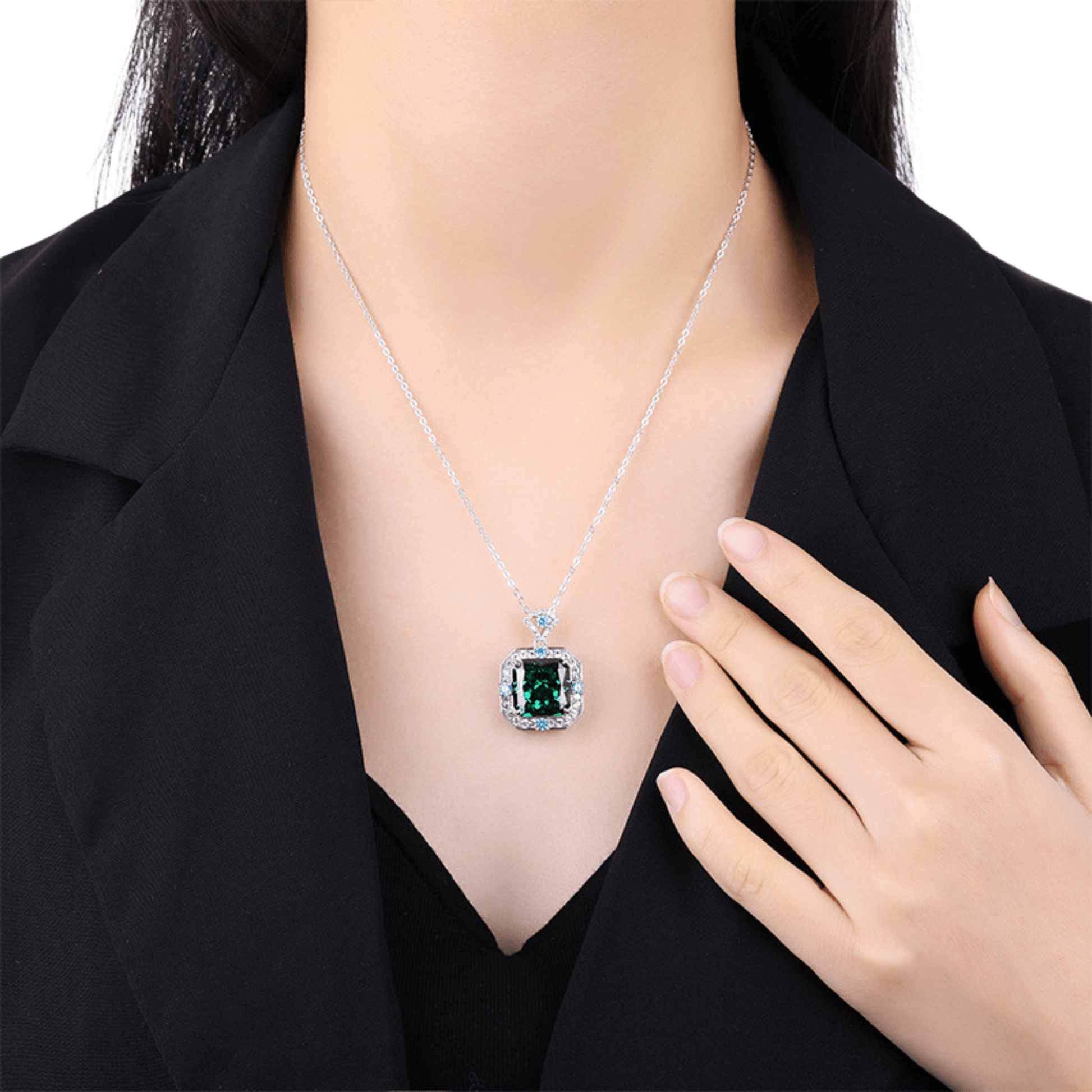 Elegant geometric silver pendant with sapphire blue and emerald accents, ideal for women’s casual or formal wear, versatile jewelry