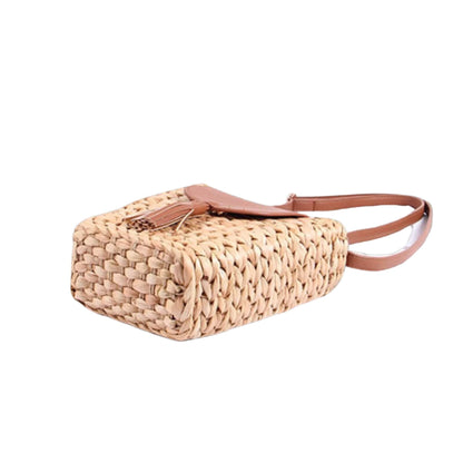 Hand-woven trapezoidal women's shoulder bag with durable polyester lining, zipper buckle closure, and elegant weaving design. Stylish accessory for daily use