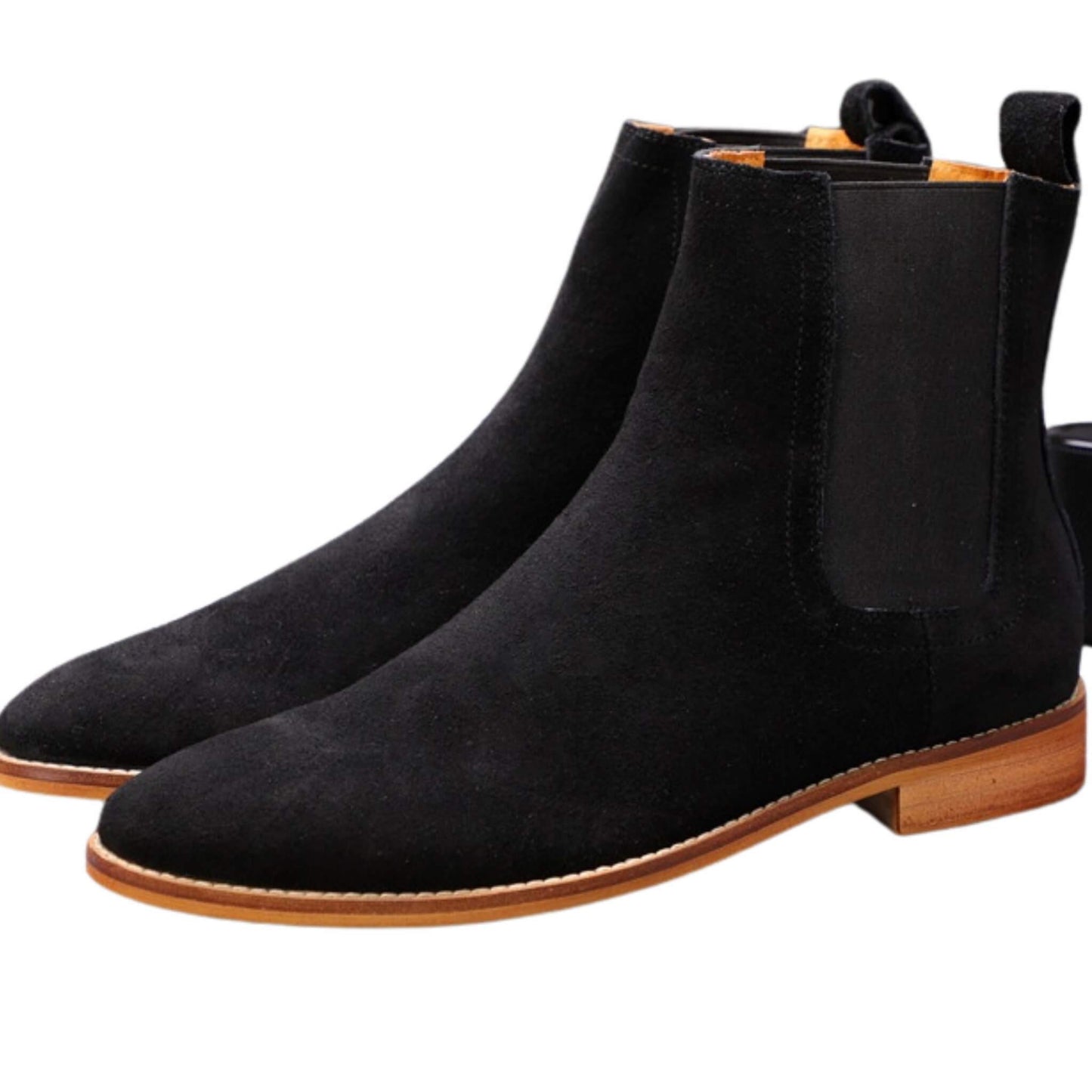 Black leather Chelsea boots for women with elastic side panels, cushioned insoles, and durable rubber soles. Ideal for fall & winter outfits and easy to wear