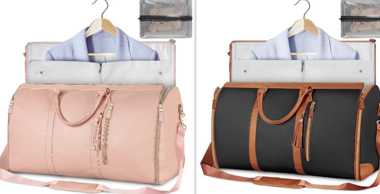 Waterproof travel duffle handbag in a sleek design, featuring sturdy handles and a detachable shoulder strap, set against a scenic outdoor backdrop