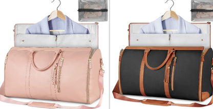 Waterproof travel duffle handbag in a sleek design, featuring sturdy handles and a detachable shoulder strap, set against a scenic outdoor backdrop