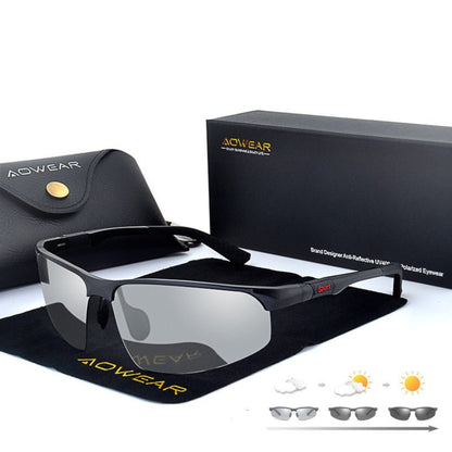 A pair of aluminum-magnesium polarized sunglasses designed for style and functionality. These lightweight sunglasses feature a modern frame with a sleek finish, offering durability and comfort. The polarized lenses provide excellent UV protection and reduce glare, making them ideal for outdoor activities and sunny days