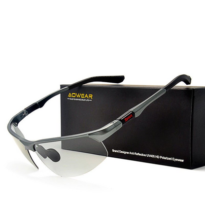 A pair of aluminum-magnesium polarized sunglasses designed for style and functionality. These lightweight sunglasses feature a modern frame with a sleek finish, offering durability and comfort. The polarized lenses provide excellent UV protection and reduce glare, making them ideal for outdoor activities and sunny days